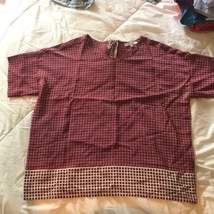 Made well premium silk top. Tie back